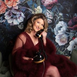 Kellie Frye Photographer self portrait wearing Catherine D'Lish robe and talking on vintage black phone