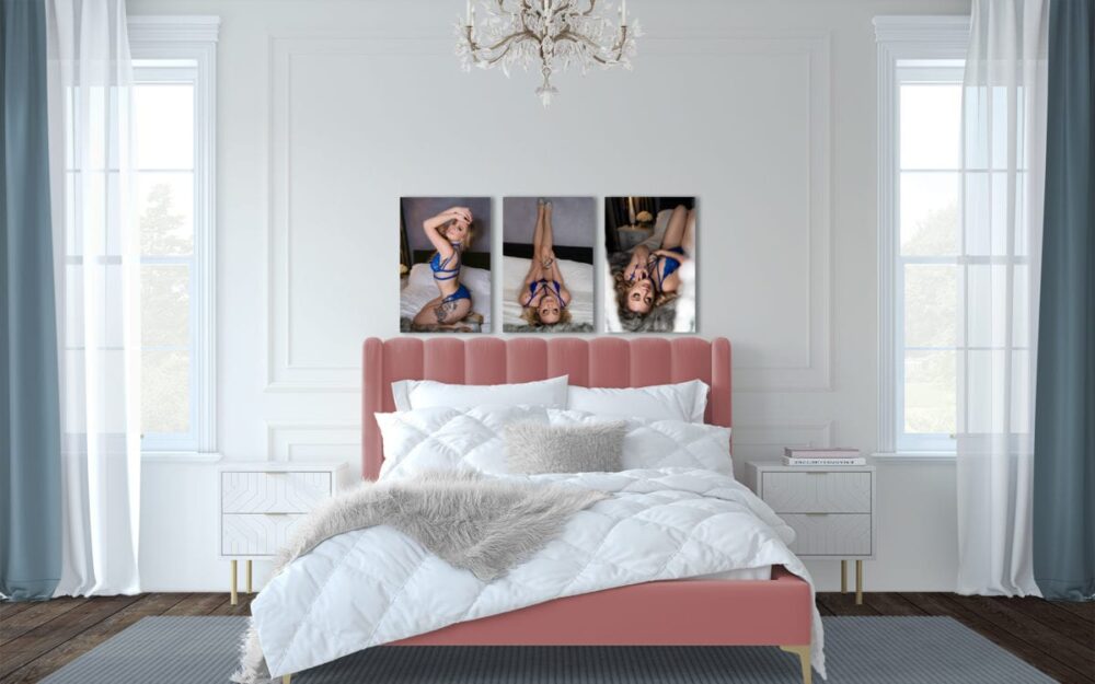 three boudoir images featured as custom wall art in a bedroom with a pink velvet bed