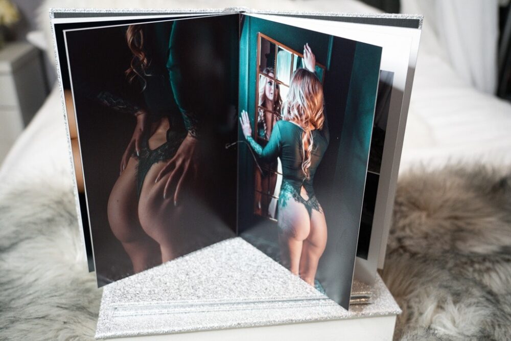 An open book with a photo of a woman's butt taken for Northern Virginia Boudoir Photography.